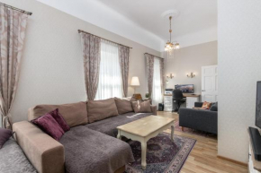 Central, Spacious, Elegant Apartment & Free Locked Parking!